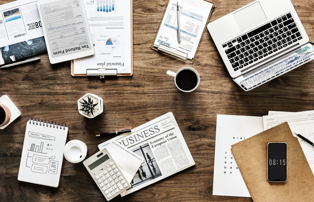 Young entrepreneur reviewing import paperwork for Australian startup